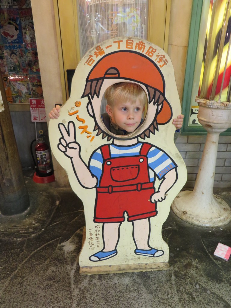 One of my favorite cut-out pictures of Liam: Odaiba, Tokyo, in March.
